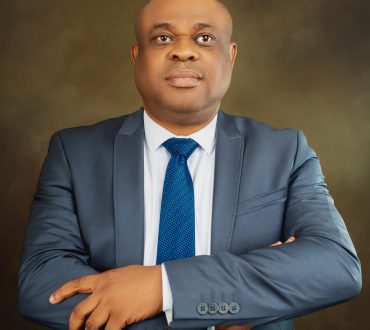 Olusina Ayegbusi - Corporate Picture