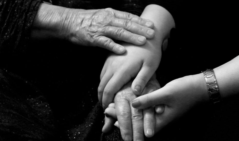 inheritance passing down from generation depicted through hands